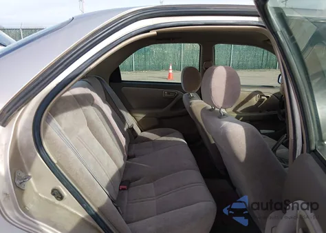 1998 Toyota Camry Le z USA, uszkodzony, nr VIN 4T1BG22K1WU318236